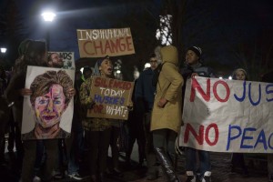 Students rally outside of UConn President Susan Herbst's office in Gully Hall Tuesday evening.