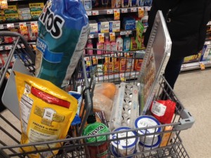 UConn senior Elyssa Eisenberg filled her cart with goodies like chips, salsa and cookie dough. She said although they weren't items typically on her grocery list, the snow day warranted special treats.