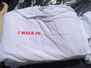 Shirts given out at the event read "I walk to ______", with participants given the option to fill in the blank. (Photo: John Ewen)